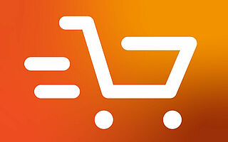 Weißes Icon eines Einkaufswagens als Zeichen für Online-Shops auf orangenem Hintergrund 