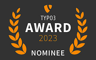 Logo des TYPO3 Awards 2023 mit dem Zusatz Nominee und Lorberkranz